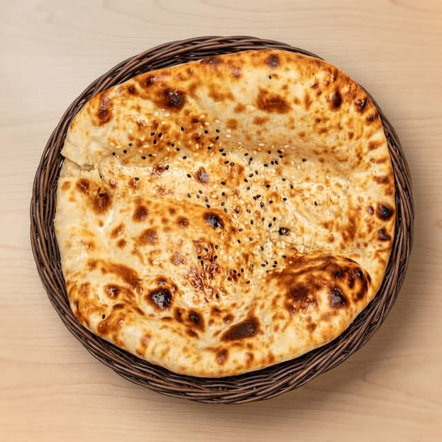 61. Garlic Naan.